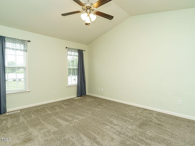 253 Middle Landing Dr, Smithfield, NC 27577 - carpeted empty room featuring lofted ceiling, a ceiling fan, and baseboards