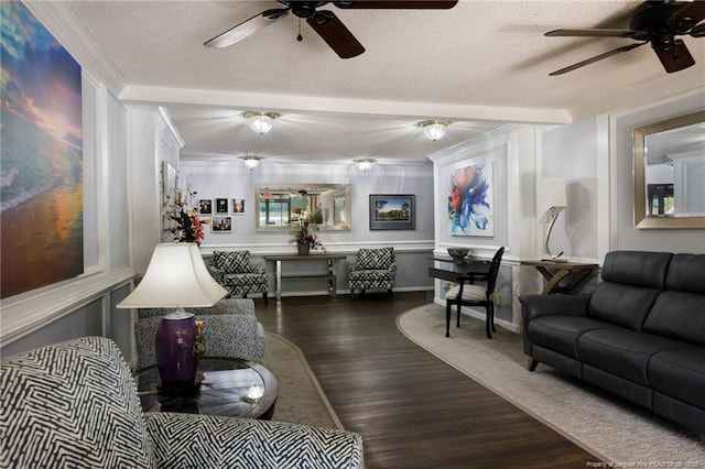 1100 Clarendon St Unit 501, Fayetteville, NC 28305 - living room featuring a ceiling fan, a textured ceiling, wood finished floors, and ornamental molding