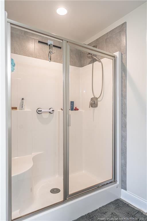 527 Weston Woods St, Raeford, NC 28376 - full bath featuring a shower stall and recessed lighting