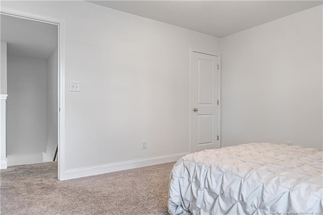 527 Weston Woods St, Raeford, NC 28376 - bedroom with carpet and baseboards