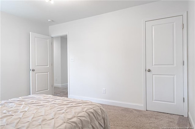 527 Weston Woods St, Raeford, NC 28376 - unfurnished bedroom featuring carpet floors and baseboards