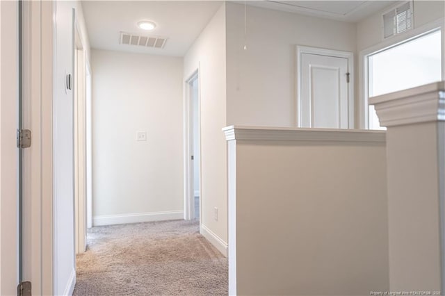 527 Weston Woods St, Raeford, NC 28376 - hall with carpet floors, baseboards, and attic access