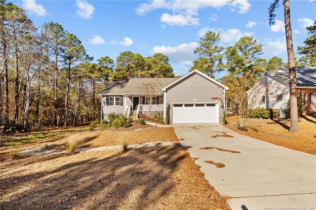ranch-style house with concrete driveway and a porch