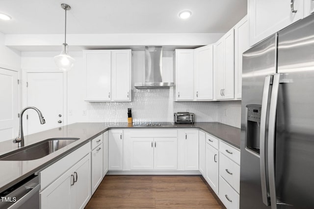 421 Wait Ave Unit 100, Wake Forest, NC 27587 - kitchen with appliances with stainless steel finishes, wall chimney range hood, a sink, recessed lighting, and white cabinets