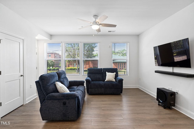 421 Wait Ave Unit 100, Wake Forest, NC 27587 - living room with wood finished floors, a ceiling fan, and baseboards