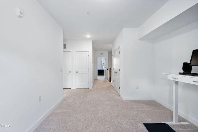 421 Wait Ave Unit 100, Wake Forest, NC 27587 - hall with light colored carpet and baseboards
