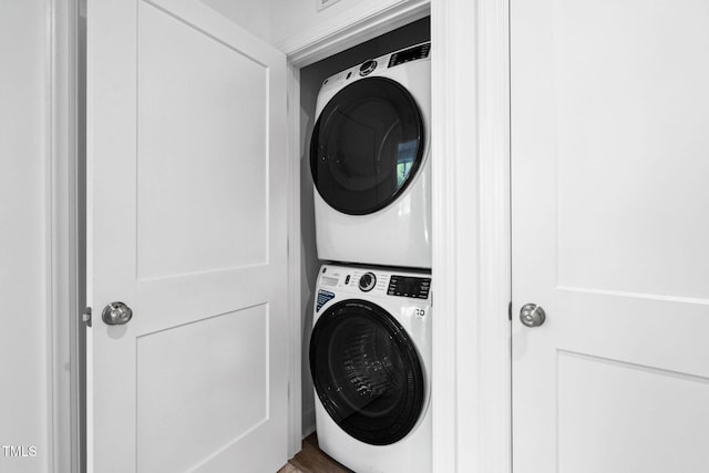 421 Wait Ave Unit 100, Wake Forest, NC 27587 - laundry room featuring stacked washer and clothes dryer