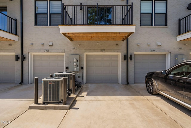421 Wait Ave Unit 100, Wake Forest, NC 27587 - garage with central AC unit and driveway
