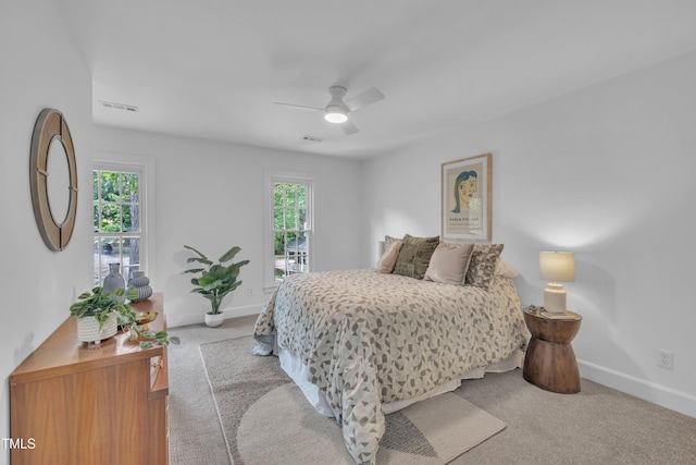 608 Cross Timbers Dr, Durham, NC 27713 - carpeted bedroom with baseboards and a ceiling fan