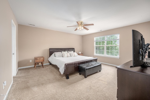 313 Weeping Willow Dr, Durham, NC 27704 - bedroom with light colored carpet, baseboards, and ceiling fan
