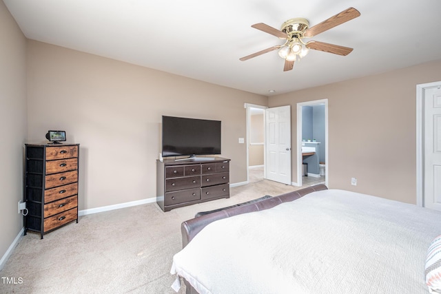 313 Weeping Willow Dr, Durham, NC 27704 - bedroom featuring light carpet, baseboards, a ceiling fan, and ensuite bath