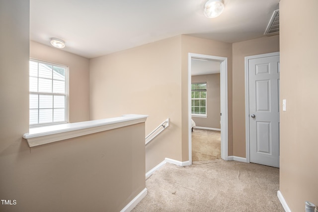 313 Weeping Willow Dr, Durham, NC 27704 - hall with carpet flooring, baseboards, and an upstairs landing