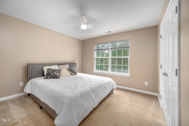 313 Weeping Willow Dr, Durham, NC 27704 - bedroom featuring carpet flooring, baseboards, and a closet
