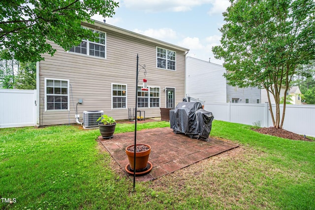 313 Weeping Willow Dr, Durham, NC 27704 - rear view of property with central AC and a patio area