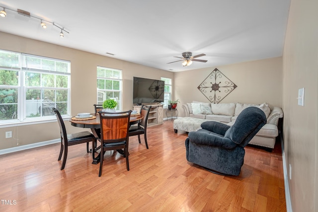 313 Weeping Willow Dr, Durham, NC 27704 - dining space featuring ceiling fan, track lighting, light wood-style floors, and baseboards