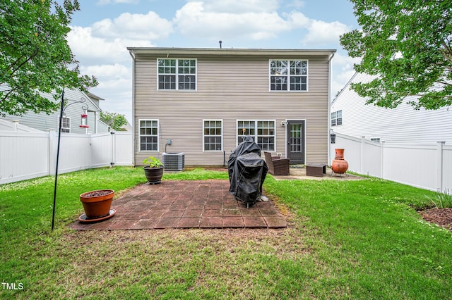 313 Weeping Willow Dr, Durham, NC 27704 - back of house with a patio area and central AC unit