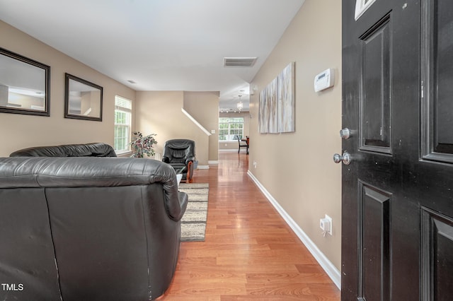 313 Weeping Willow Dr, Durham, NC 27704 - living room featuring light wood-type flooring, healthy amount of natural light, and baseboards