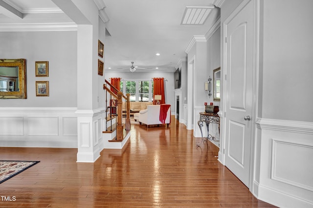 216 Colonial Ridge Dr, Pittsboro, NC 27312 - entryway featuring crown molding, wood-type flooring, recessed lighting, a decorative wall, and ceiling fan