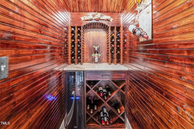 216 Colonial Ridge Dr, Pittsboro, NC 27312 - wine room featuring wood walls and wood ceiling