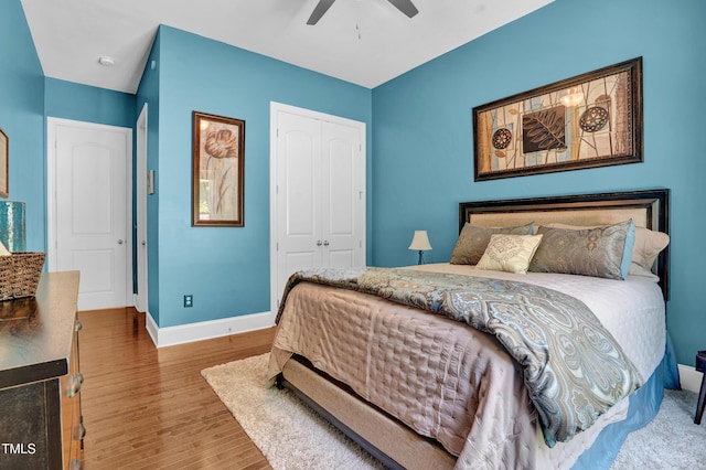 216 Colonial Ridge Dr, Pittsboro, NC 27312 - bedroom featuring a closet, baseboards, wood finished floors, and ceiling fan