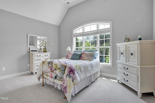 216 Colonial Ridge Dr, Pittsboro, NC 27312 - bedroom with light carpet, lofted ceiling, and baseboards