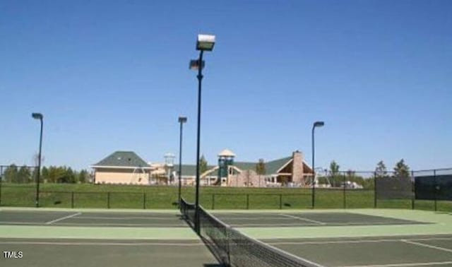 216 Colonial Ridge Dr, Pittsboro, NC 27312 - view of tennis court featuring fence