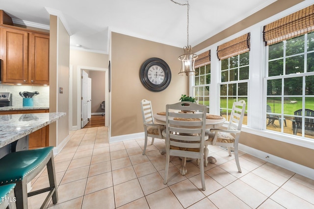 3916 Rustic Mill Dr, Apex, NC 27539 - dining area with ornamental molding, baseboards, and light tile patterned flooring