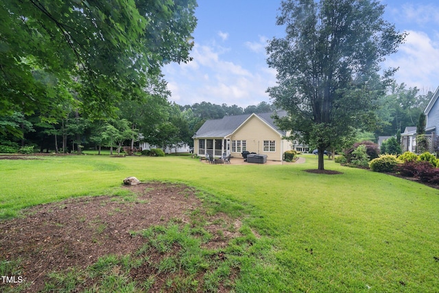 3916 Rustic Mill Dr, Apex, NC 27539 - view of green lawn with a patio area