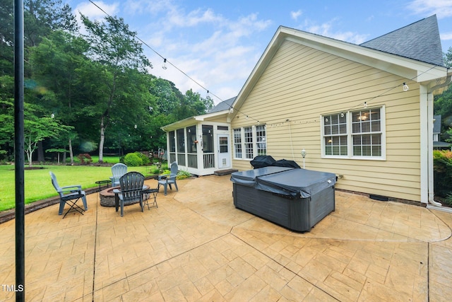 3916 Rustic Mill Dr, Apex, NC 27539 - view of patio / terrace featuring a sunroom, a hot tub, and a fire pit