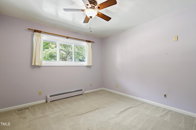 712 Beaver Dam Rd, Raleigh, NC 27607 - carpeted empty room with a baseboard heating unit, a ceiling fan, and baseboards