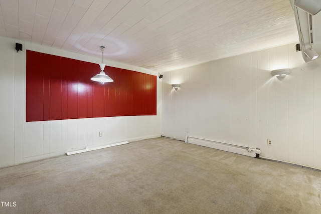 712 Beaver Dam Rd, Raleigh, NC 27607 - empty room with a baseboard heating unit and carpet flooring