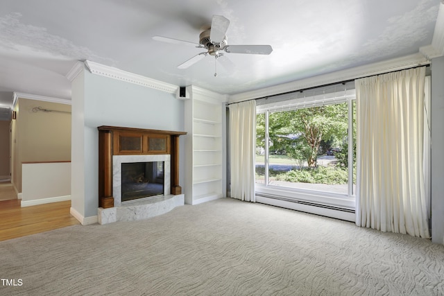 712 Beaver Dam Rd, Raleigh, NC 27607 - unfurnished living room featuring a baseboard radiator, ornamental molding, a premium fireplace, a ceiling fan, and baseboards