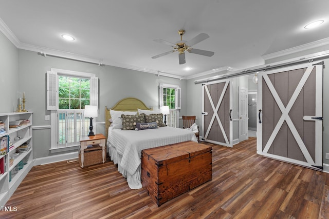 5308 Stableview Ct, Holly Springs, NC 27540 - bedroom featuring a barn door, crown molding, wood finished floors, recessed lighting, and a ceiling fan