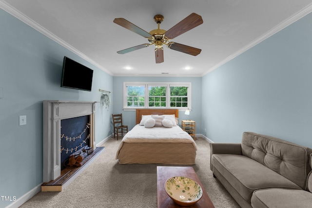 5308 Stableview Ct, Holly Springs, NC 27540 - carpeted bedroom with crown molding, a fireplace, a ceiling fan, and recessed lighting