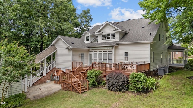 5308 Stableview Ct, Holly Springs, NC 27540 - rear view of property featuring roof with shingles, a wooden deck, a lawn, and stairway