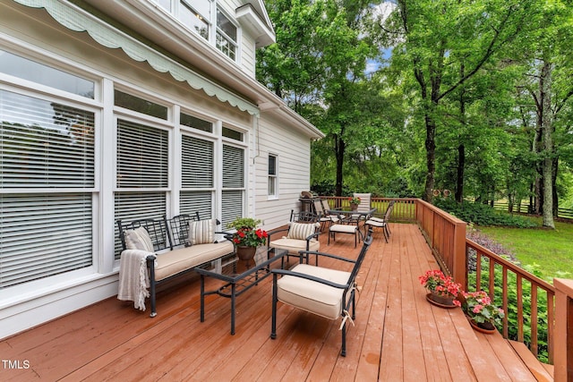 5308 Stableview Ct, Holly Springs, NC 27540 - wooden deck featuring outdoor dining area and view of wooded area