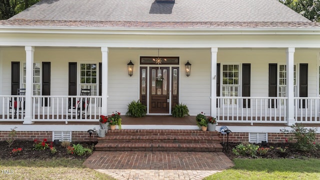 5308 Stableview Ct, Holly Springs, NC 27540 - property entrance featuring a porch and a shingled roof