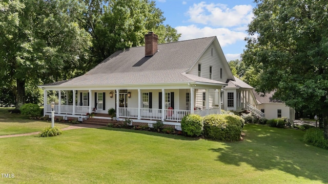 5308 Stableview Ct, Holly Springs, NC 27540 - country-style home featuring covered porch, a front lawn, a chimney, and roof with shingles