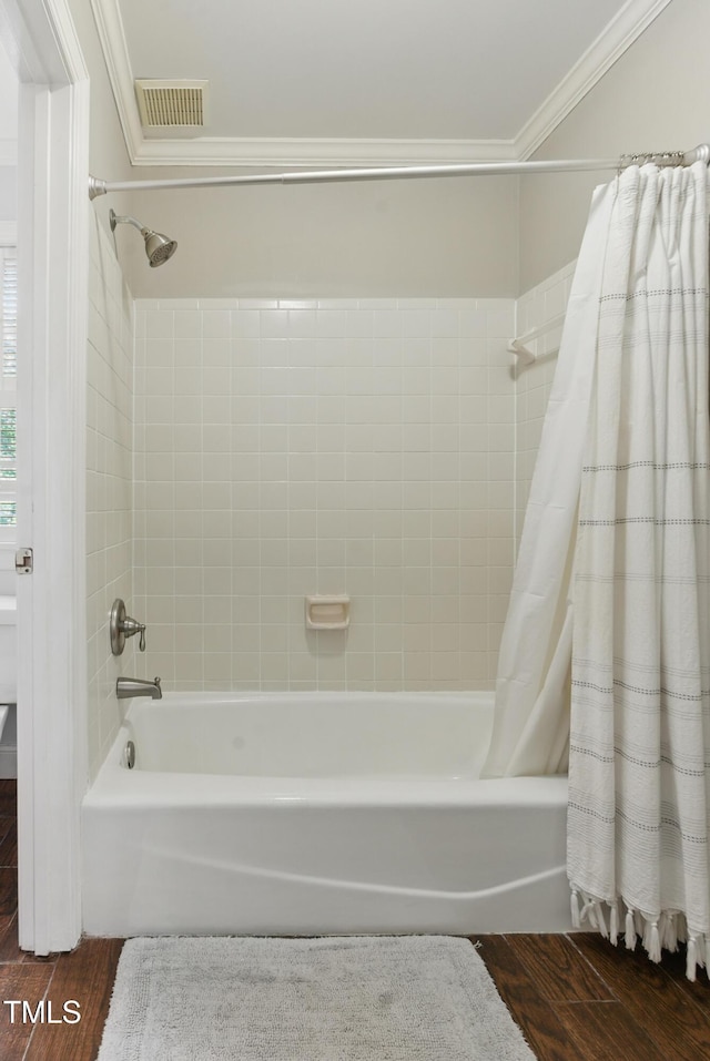 5308 Stableview Ct, Holly Springs, NC 27540 - bathroom with shower / tub combo, ornamental molding, and wood finished floors