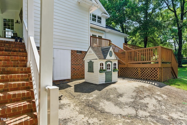 5308 Stableview Ct, Holly Springs, NC 27540 - view of side of property featuring a wooden deck
