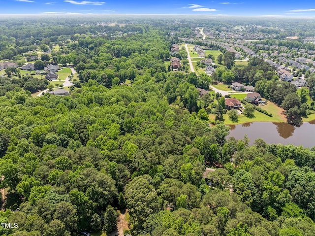 5308 Stableview Ct, Holly Springs, NC 27540 - drone / aerial view of a heavily wooded area and a nearby body of water