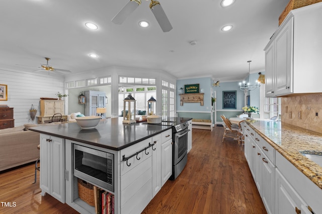 5308 Stableview Ct, Holly Springs, NC 27540 - kitchen featuring a ceiling fan, stainless steel appliances, recessed lighting, open floor plan, and white cabinets