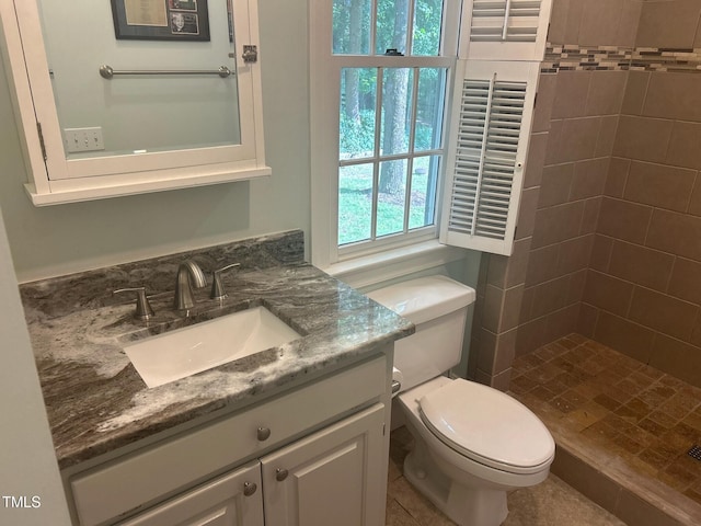 5308 Stableview Ct, Holly Springs, NC 27540 - bathroom with vanity and tiled shower