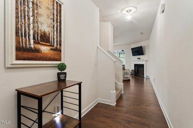 270 Wembley Dr, Clayton, NC 27527 - hallway featuring wood finished floors, stairway, and baseboards