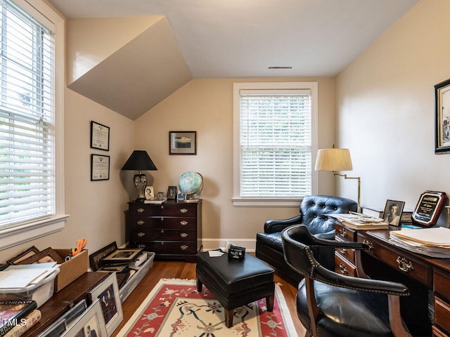 office featuring wood finished floors and vaulted ceiling