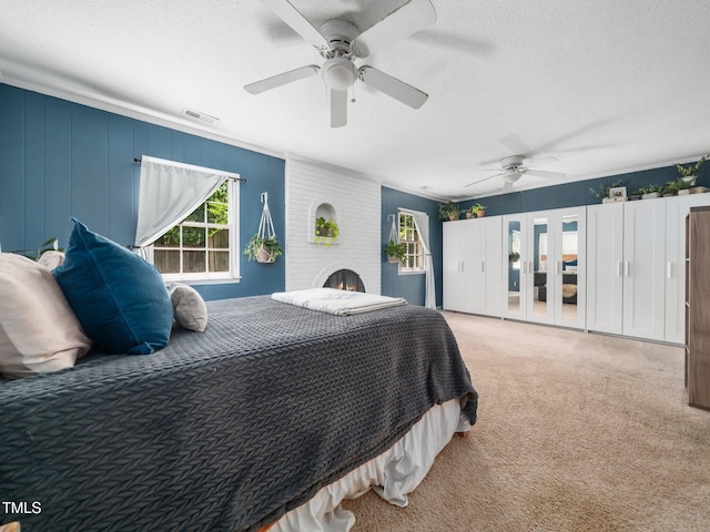 7605 Copper Mine Ln, Raleigh, NC 27615 - carpeted bedroom with a textured ceiling and a ceiling fan