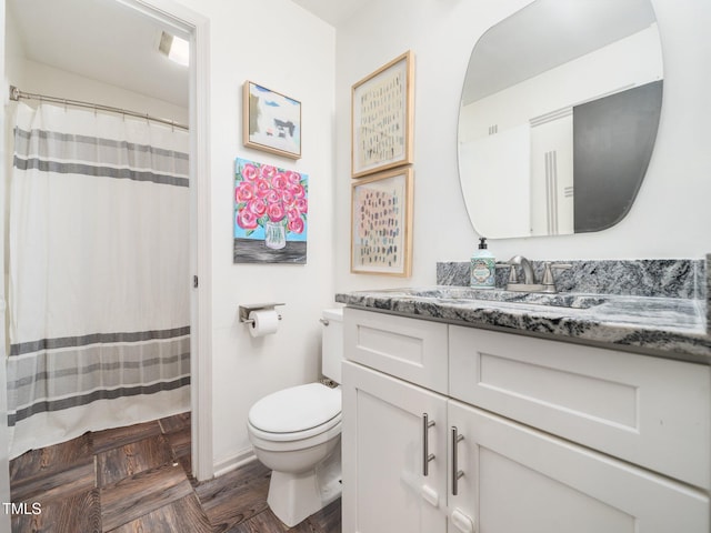 7605 Copper Mine Ln, Raleigh, NC 27615 - bathroom featuring vanity, toilet, and a shower with shower curtain