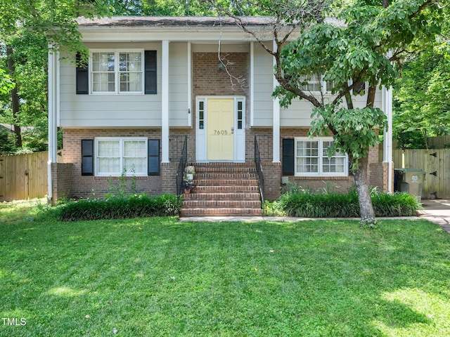 7605 Copper Mine Ln, Raleigh, NC 27615 - raised ranch with brick siding
