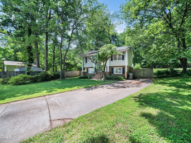 7605 Copper Mine Ln, Raleigh, NC 27615 - split foyer home with brick siding and driveway