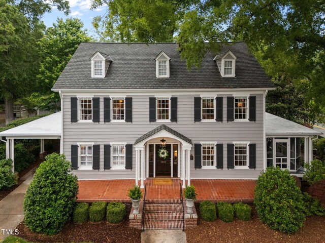 1015 Watts St, Durham, NC 27701 - view of front facade with a sunroom